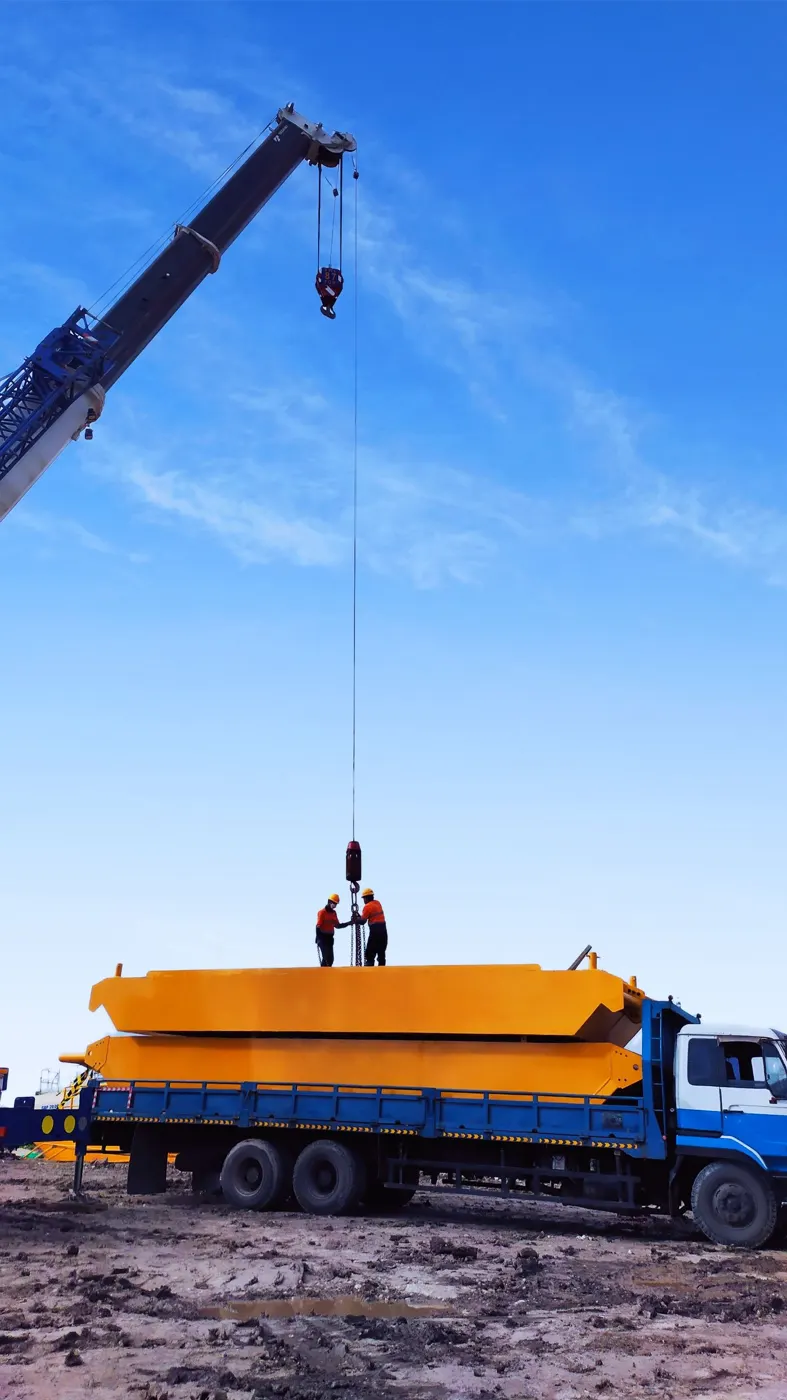 Crane rental Baton Rouge – Crane loading on a truck at a construction site (stock photo, Baton Rouge equipment rental guide)